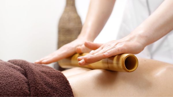 Massage au Bambou – Énergie & Légèreté